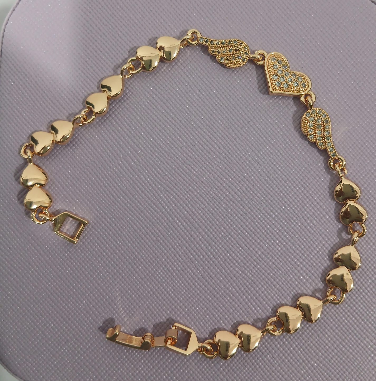 Golden Heart & Wings Bracelet – The Elegance of Love in Motion
