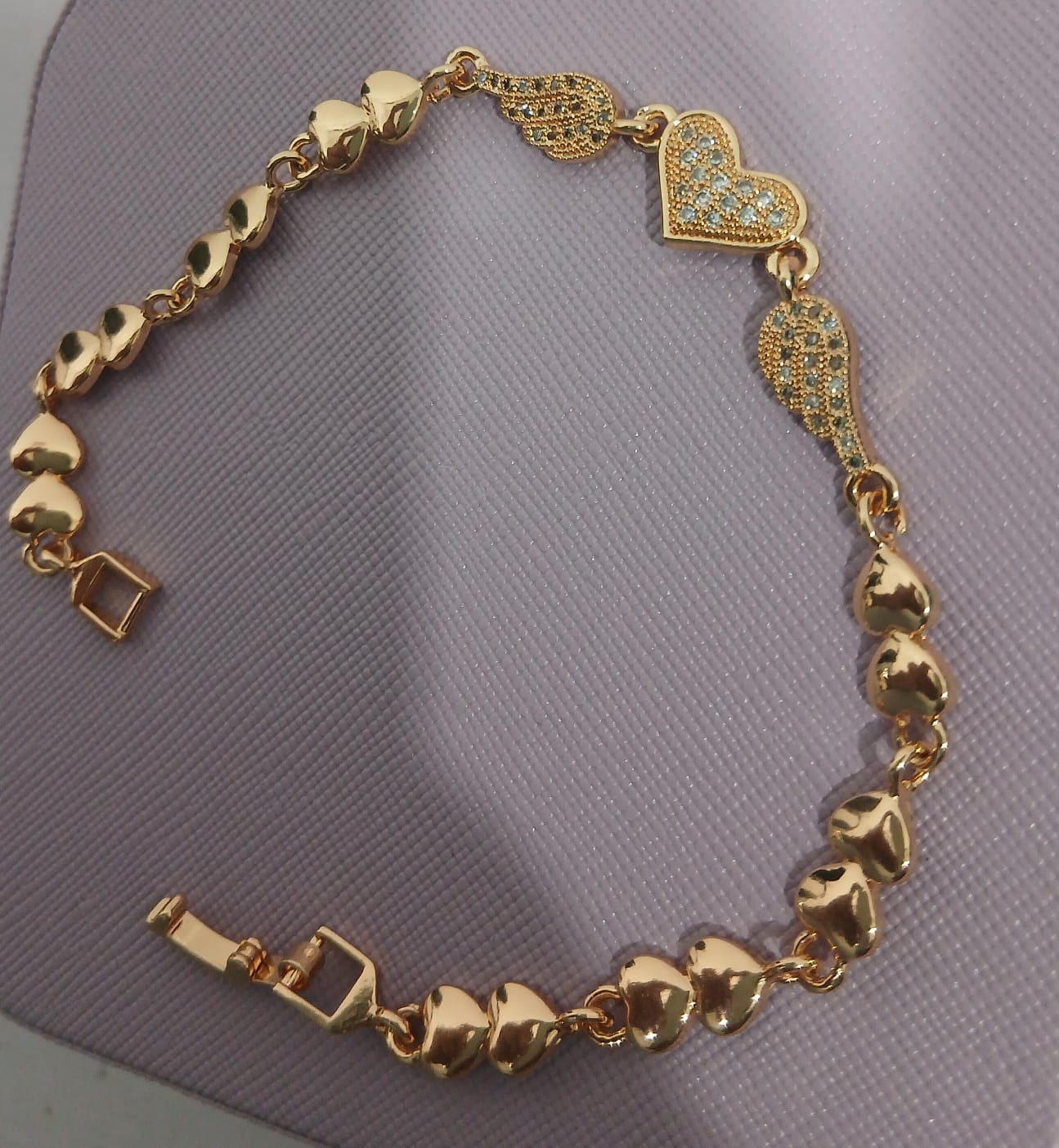 Golden Heart & Wings Bracelet – The Elegance of Love in Motion