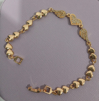 Golden Heart & Wings Bracelet – The Elegance of Love in Motion