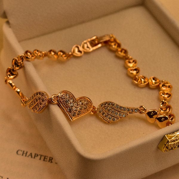 Golden Heart & Wings Bracelet – The Elegance of Love in Motion