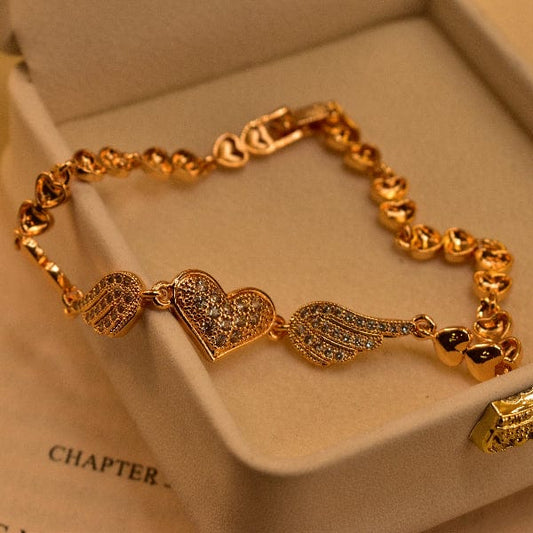 Golden Heart & Wings Bracelet – The Elegance of Love in Motion